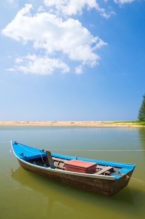 Boat at beach and blue skyの写真素材