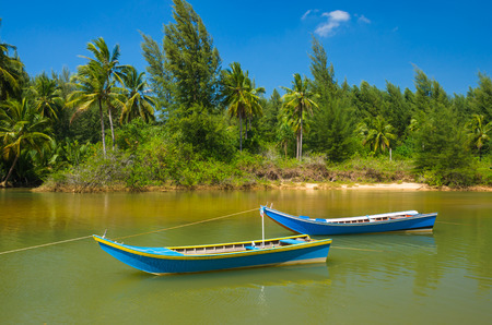 Boat at beach and blue skyの写真素材