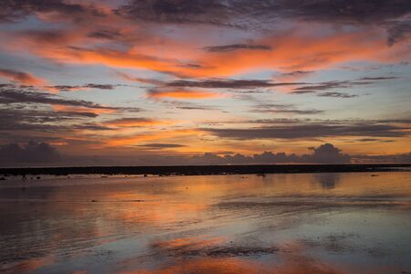 sunset on the beach of andaman seaの写真素材