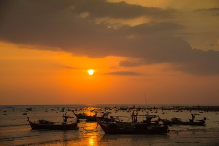 Fishing boats and cloud sky at sea Thailandの写真素材