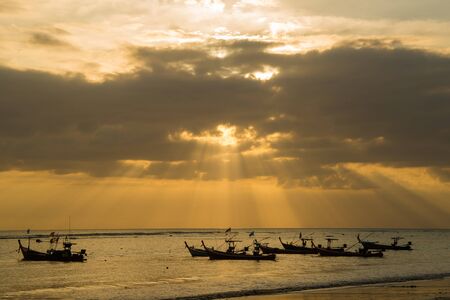 sunset on the beach of andaman seaの写真素材