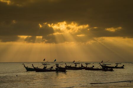 sunset on the beach of andaman seaの写真素材