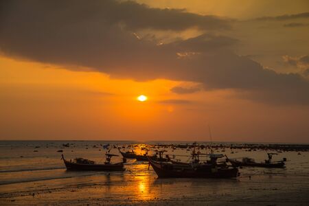 Fishing boats and cloud sky at sea Thailandの写真素材