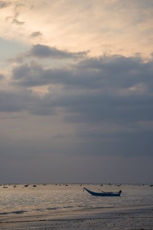 sunset on the beach of andaman seaの写真素材