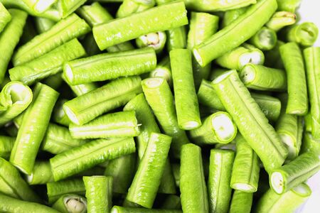 Green beans on the floorの写真素材