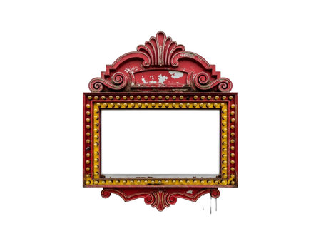 A beautifully crafted red and gold mirror with intricate floral designs and ornate scrollwork.の素材