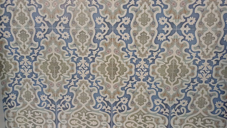 This image showcases a fabric with a detailed and symmetrical pattern. The design features a...