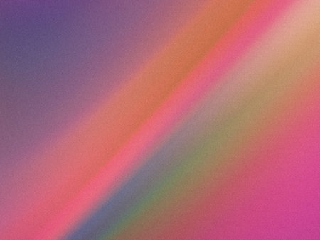 a vibrant rainbow gradient with a grainy texture, transitioning from purple to pink, orange, and...