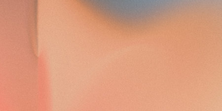 The image showcases a seamless gradient transition between warm peach tones and cooler, muted grays...