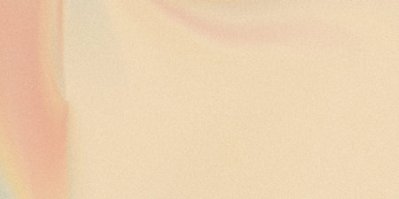 This image showcases a smooth gradient transition between two pastel shades, light pink and peach,...