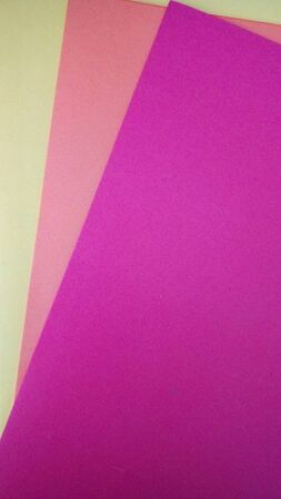 Yellow, orange and purple cards creatively sortedの写真素材
