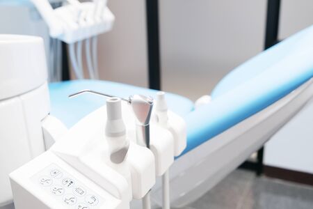 Medical equipment and stomatology concep. Dental chair and other accesries used by dentists in the office.の写真素材
