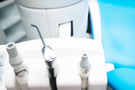 Medical equipment and stomatology concep. Dental chair and other accesries used by dentists in the office.の写真素材