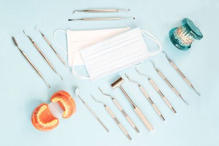 dentist tools and orthodontic on color background, flat lay, top vipw.の写真素材