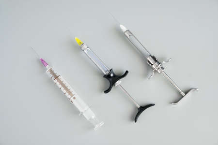 Dentistry medical tools forcept on blue background.の写真素材