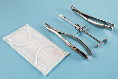 Dentistry medical tools forcept upper/ lower on blue background.の写真素材