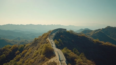 Stunning aerial view of the Great Wall of China nestled among rolling mountains. This historical marvel showcases a blend of nature and ancient architecture, perfect for travel and adventure enthusiasts.の素材