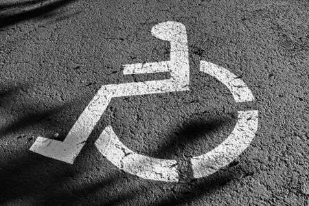 wheel chair sign parking spotの写真素材