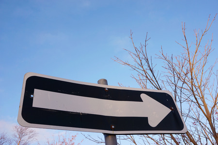 Warning road sign - go right, with copy space for your text or images.の写真素材