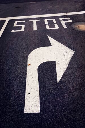 Stop before turn right arrow on street,vintage styleの写真素材