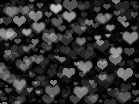 Abstract black background with heartsの写真素材
