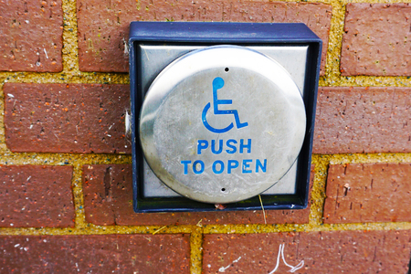 handicap push button door opener,in front of mallの写真素材