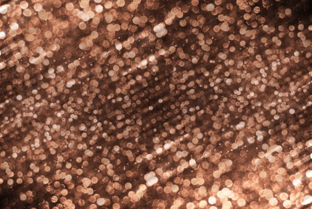black and copper glitter bokeh texture abstract background
