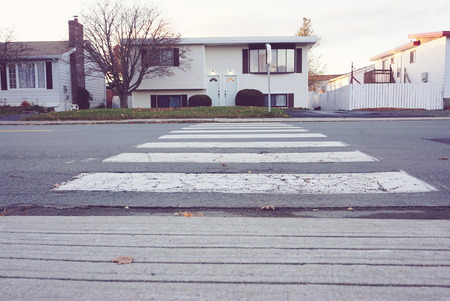 crosswalk in residential areaの写真素材