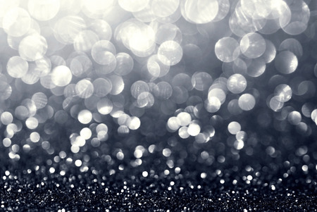 white silver glitter bokeh texture abstract backgroundの写真素材