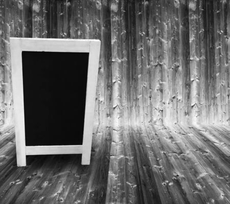 Wooden style floor stage and wall with blank blackboardの写真素材