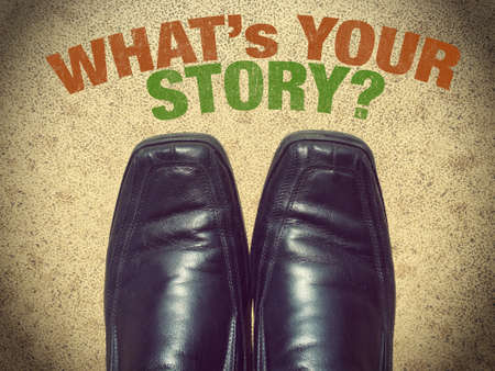 Black men shoes shoes with words What's your story?の写真素材