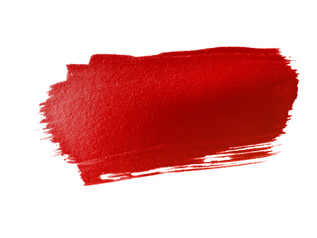 red paint smear stroke stain on white backgroundの写真素材