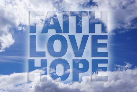 Faith love hope on blue sky backgroundの写真素材