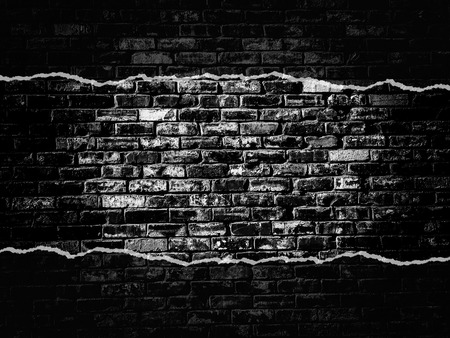 old black vintage brick wall texture background with darker vignetteの写真素材