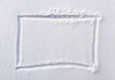 hand drawn square shape in the fresh snowの写真素材