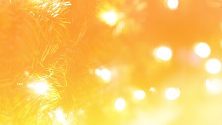 Abstract Christmas gold lights bokeh backgroundの写真素材