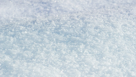 White blue Glitter bokeh from snow texture background