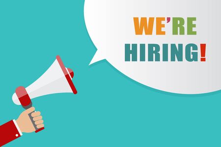 Hand holding Megaphone with speech bubble on blue background with words we're hiring, vector illustration.のイラスト素材