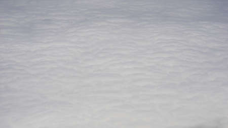 fluffy clouds, view from planeの写真素材