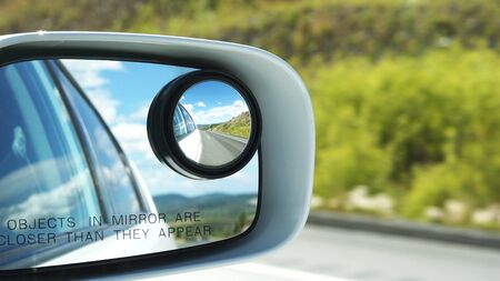 Side rear view mirror on a carの写真素材