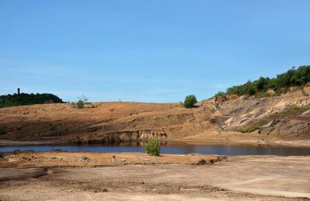 The Impact of coal mining on the environment. The mining location was abandoned without reclamation. Location: Sangatta, East Kalimantan/Indonesia.の写真素材