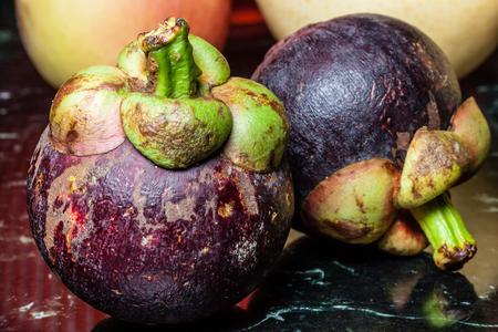 Mangosteen a tropical fruit known for its delicious taste.の写真素材
