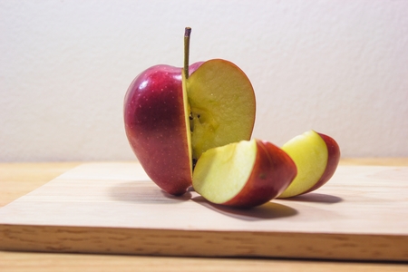 Ripe red apples on woodenの写真素材