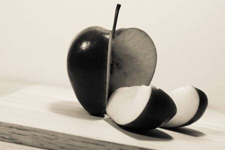Ripe red apples on woodenの写真素材