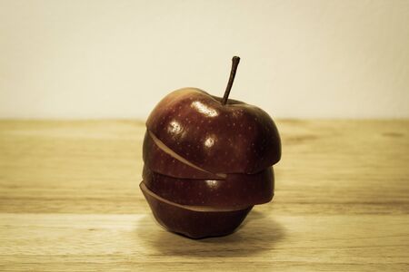 Ripe red apples on woodenの写真素材