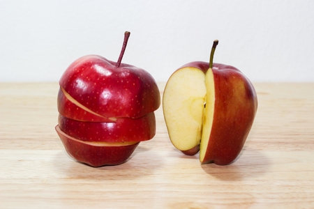 Ripe red apples on woodenの写真素材