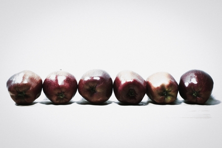 Ripe red apples on woodenの写真素材