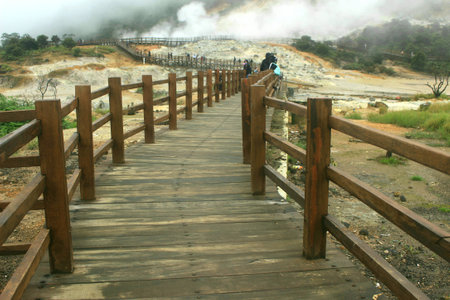 The newest tourist spot of the Kahyangan Bridge from the Sikidang Crater tourist attraction. Dieng Indonesia.の写真素材