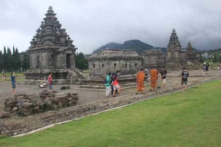 Dieng, Indonesia: 29 december 2020: visitors travel to the Dieng Temple Complex tourism object. Dieng Indonesiaのeditorial素材