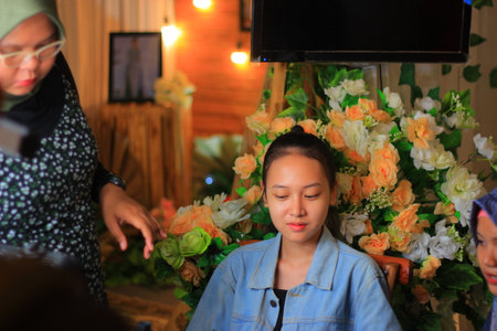 Pekalongan, Indonesia - January 4, 2020: makeup and wedding dresses that exude the beauty and elegance of Indonesian women at the Pekalongan Wedding Fairのeditorial素材
